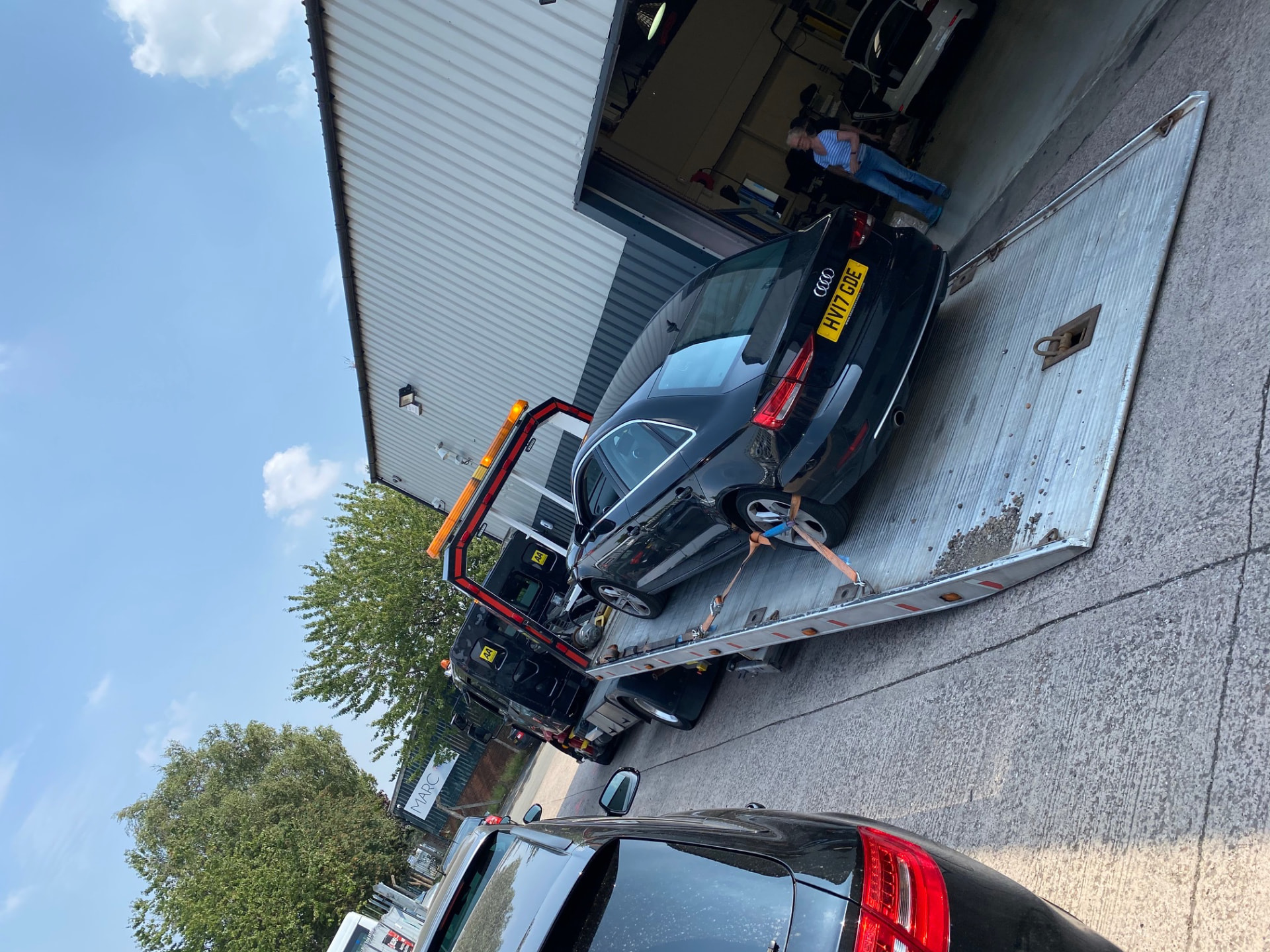 Car secured on a transporter