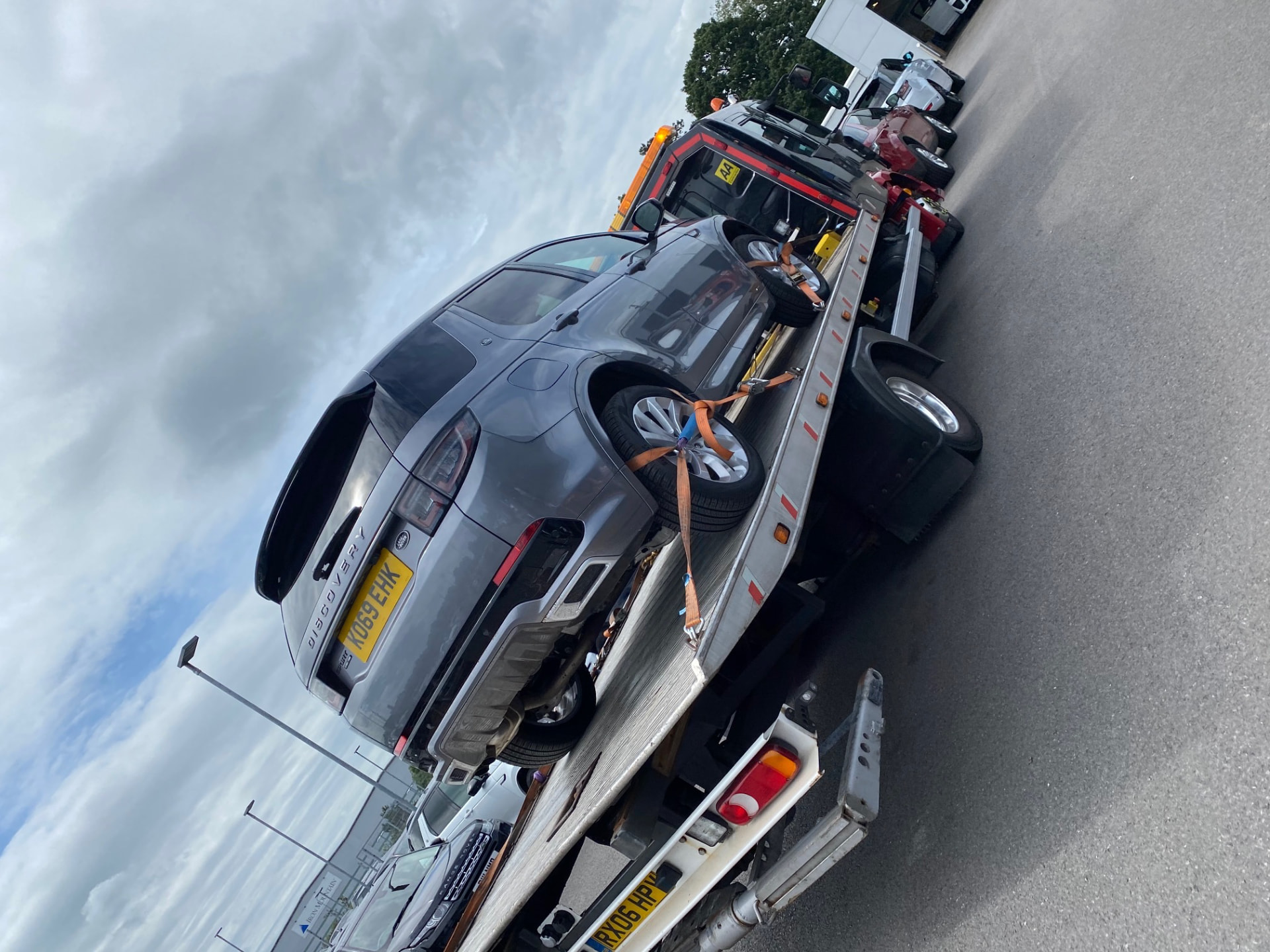 Car loaded on a recovery vehicle